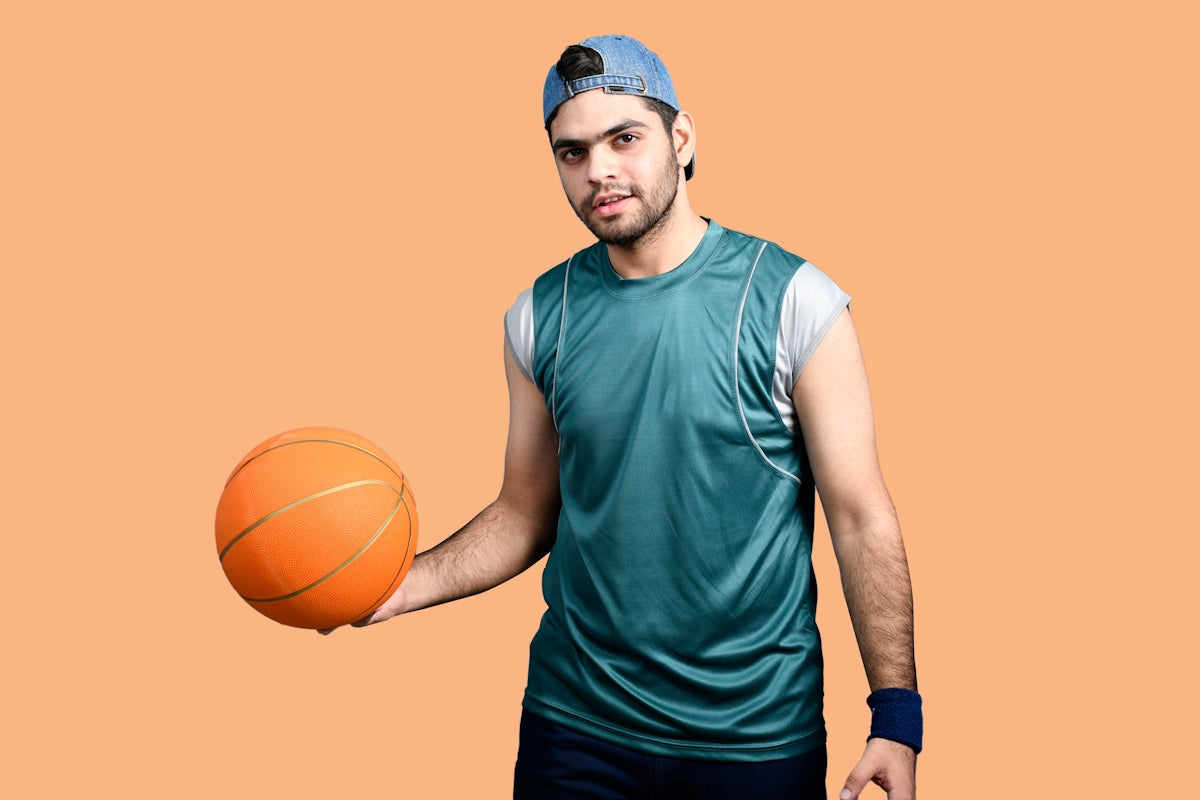 a man holding a basketball