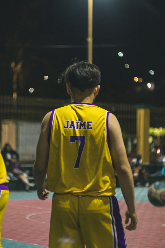 a man in a yellow jersey