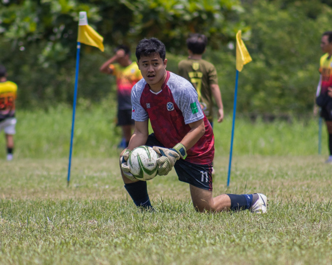 a group of young men playing a game of soccer