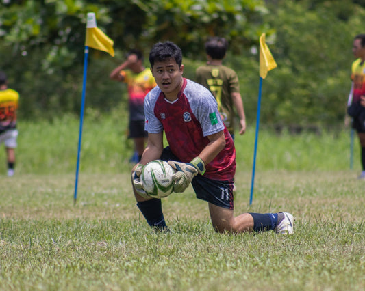 a group of young men playing a game of soccer